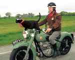 Rastus the cat and his owner together on a motorcycle
